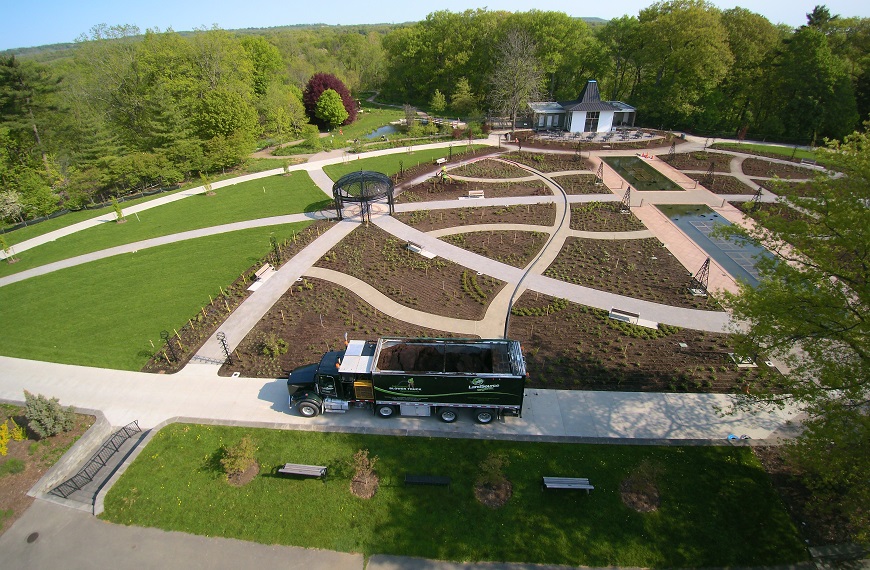 Contractor Blowing Mulch for Landscaper